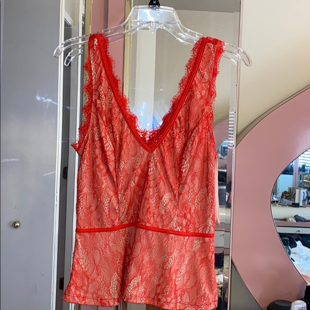 red peplum see thru lace back top